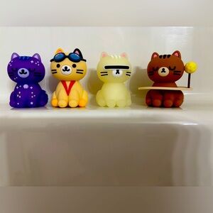 Set of Four Smoko Space Cat Figurines